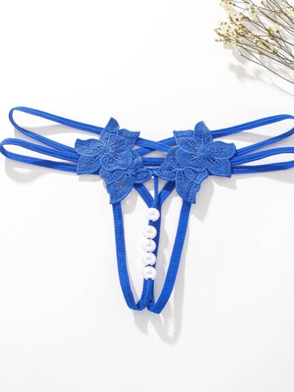 Blue floral lace pearl open crotch strappy thong panty flat lay