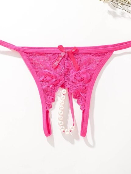 Hot pink lace pearl crotchless panty flat lay product image
