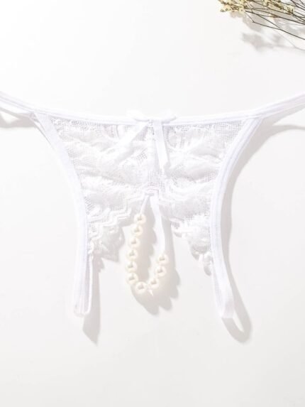 White lace pearl crotchless panty flat lay product image