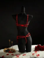 Back view of red strappy lingerie set with adjustable straps and thong back